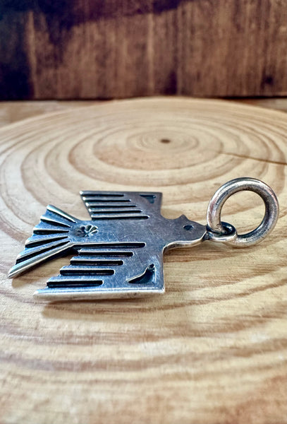 DAN DODSON THUNDERBIRD and Sterling Silver Dog Tag Charm