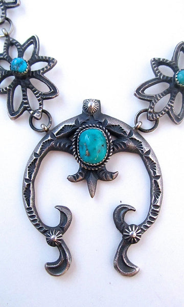 KEVIN BILLAH Sandcast Sterling Silver and Kingman Turquoise Naja Squash Blossom