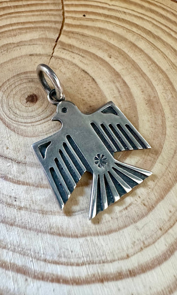 DAN DODSON THUNDERBIRD and Sterling Silver Dog Tag Charm