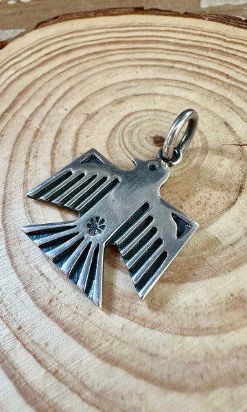DAN DODSON THUNDERBIRD and Sterling Silver Dog Tag Charm