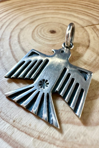 DAN DODSON THUNDERBIRD and Sterling Silver Dog Tag Charm