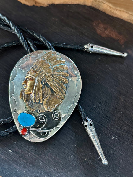CHIEFS HEAD Bolo Tie w/ Leather Cord, Silver Color Likely Nickel, Brass, Faux Turquoise, Coral